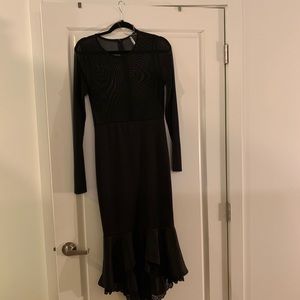 Sexy black fishtail dress with sheer top. Sz 14.